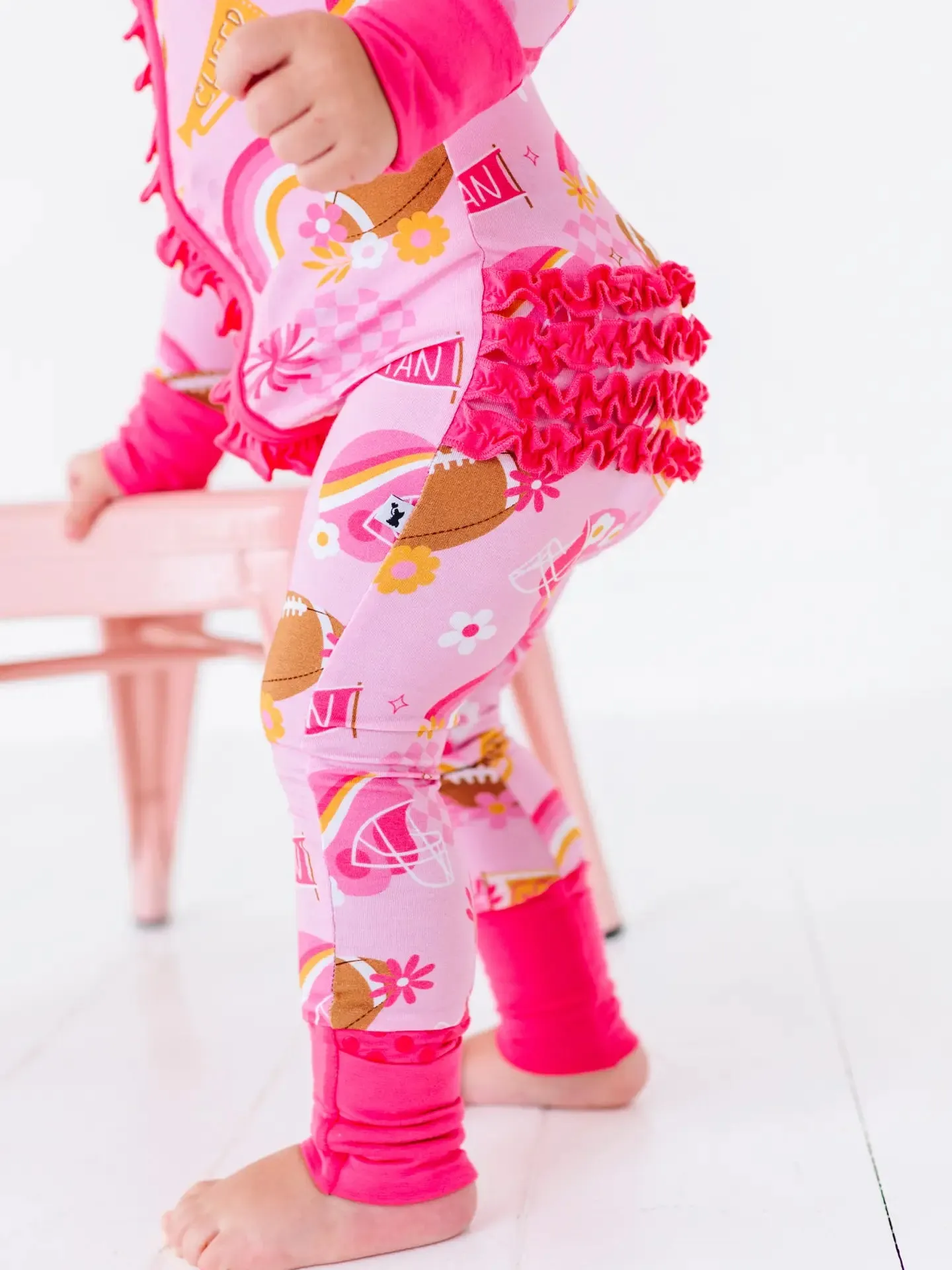 On Game Days We Wear Pink Convertible Footies with Ruffle